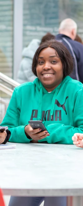 Student sitting in a communal area at Glasgow Kelvin College’s East End Campus, working or relaxing in a modern, shared space. Student sitting in a communal area at Glasgow Kelvin College’s East End Campus, working or relaxing in a modern, shared space.